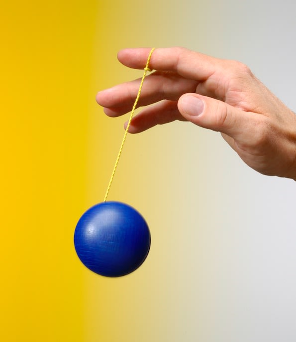 Holding a Yo-Yo in a hand