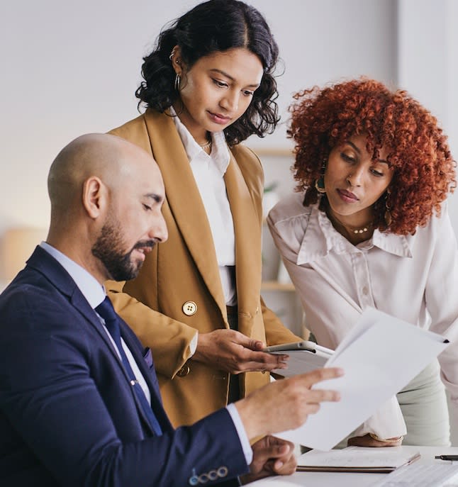 Financial advisors providing consultation to a businessman