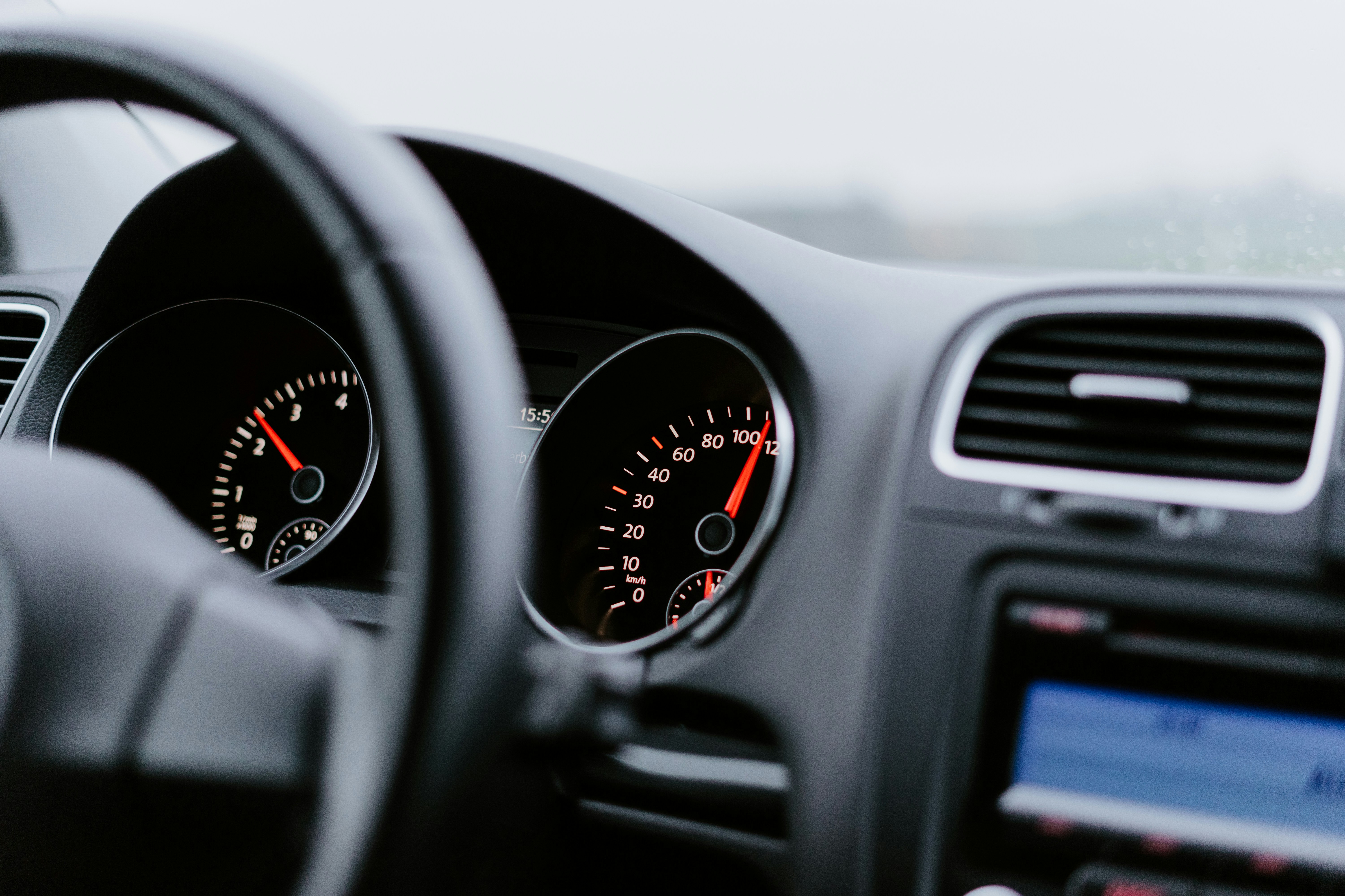 Black and grey vehicle dashboard (Julian Hochgesang via Unsplash)